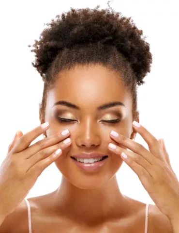 Beautiful,Woman,Doing,Facial,Massage,,Touching,Her,Face.,Photo,Of